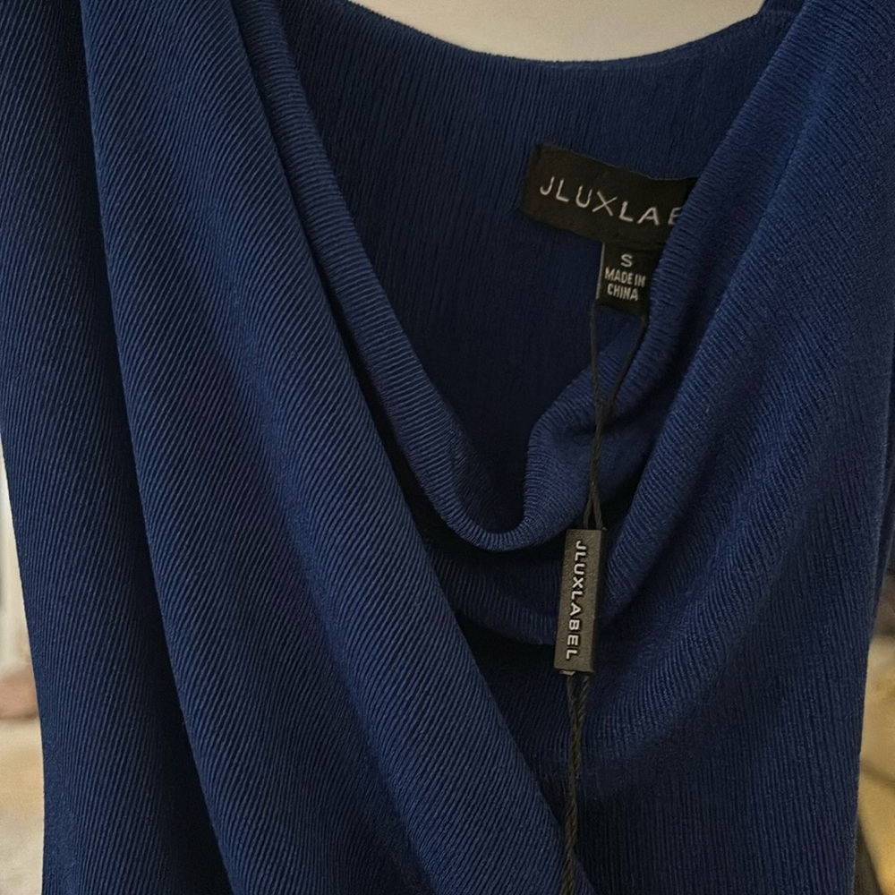 Never worn Blue tight ruched dress.